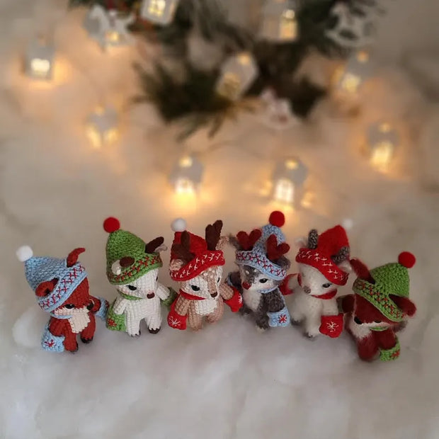 3 baby animals in cute Christmas hats and mittens pattern